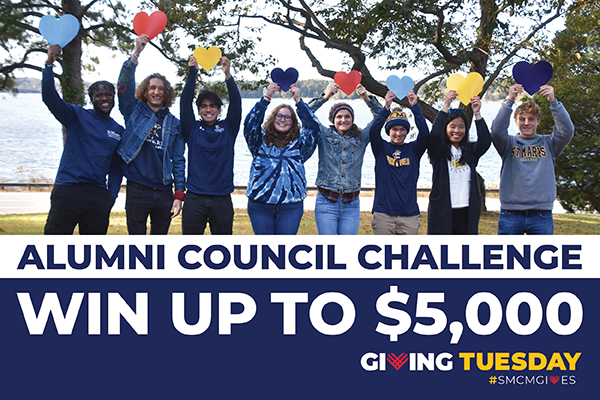 A group of students hold hearts up in the air with the water in the background on a graphic saying Alumni Council Challenge Win Up to $5,000 Giving Tuesday #smcmgives